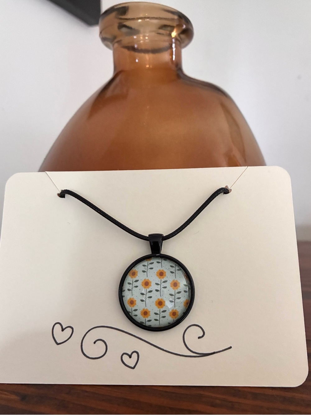 Handcrafted Sunflower Pattern Round Pendant Necklace - Black Frame